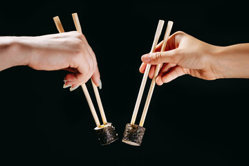 Sushi in Chinese chopsticks