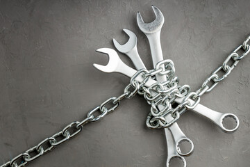 hand tool wrench chained. shackle work