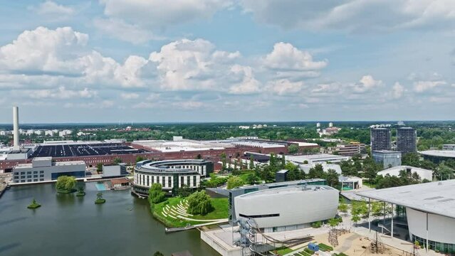Drone shot of The Autostadt ( Automobile City) , a visitor attraction adjacent to the Volkswagen factory in Wolfsburg, Germany, with a prime focus on automobiles. Volkswagen car museum, driving tracks
