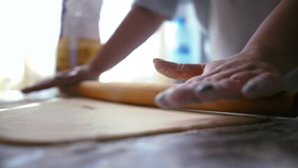 Dough Rolling Mastery: Woman's Art of Crafting Perfect Pastries