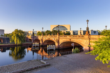 The stone Moltke (Moltkebrücke) bridge over Spree River in central district of Berlin with Federal...