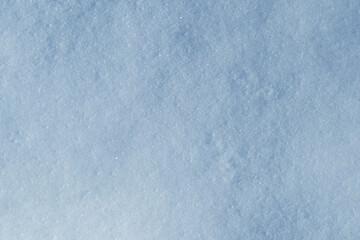 White snow texture with ice crystals in winter with copy space