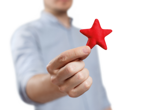 Male hand holding a red small star, cut out
