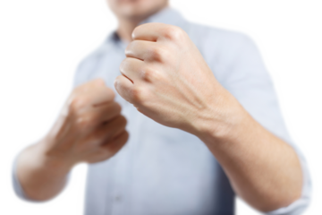 Man raised his fists ready to fight, cut out