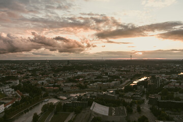 Beautiful aerial landscape of Neris river winding through Vilnius city.