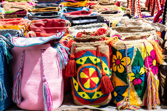 Street selling in Bogota of traditional bags hand knitted by women of the Wayuu community in Colombia called mochilas