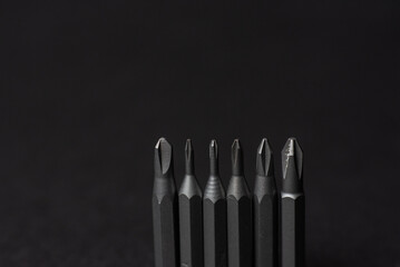 set of metal mini screwdrivers close-up - obrazy, fototapety, plakaty