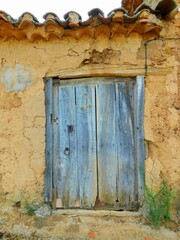 Fototapeta na wymiar ancient door in rural landscapes