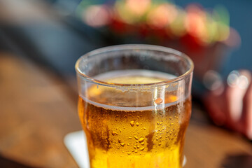 Glass of beer on the table