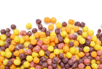 Delicious and nutritious fruit cereal loops flavorful, healthy and funny addition to kids breakfast in bowl on white background 