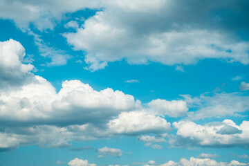 Obraz na płótnie Canvas Unusual beautiful sky with snow-white clouds