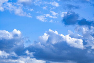Unusual beautiful sky with snow-white clouds