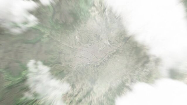 Earth zoom in from space to Cuenca, Ecuador. Followed by zoom out through clouds and atmosphere into space. Satellite map top down panoramic view. Travel intro