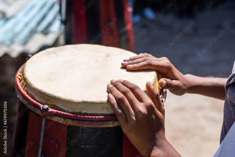 Canvas Prints Hands of a musician standing still on a Brazilian atabaque.