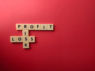Top view toys letters with the word PROFIT RISK LOSS