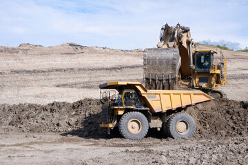 over burden loading in coal mine from excavator into truck, coal mine industry