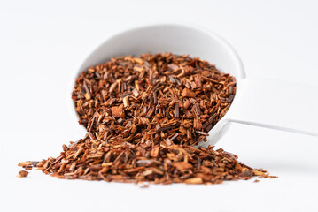Loose Rooibos Tea Leaves Spilled from a Teaspoon
