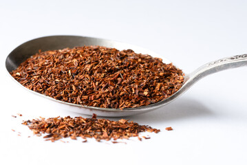 Loose Rooibos Tea Leaves on a Vintage Spoon