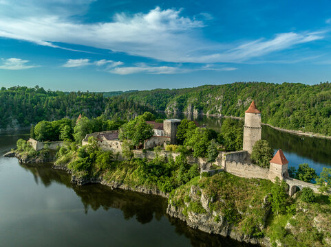 Aerial view of early Gothic Zvikov castle on difficult-to-access and steep promontory above the confluence of the Vltava and Otava rivers in Bohemia