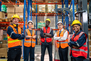 Portrait group of diverse industry worker working in factory warehouse.