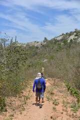 Fototapeta premium hiking in the mountains, hiking in the trails, couple on the trails, hiker in the trails, Araruna, Brazil, group of hikers 