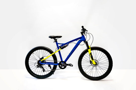 New blue bicycle isolated on a white background. High quality photo