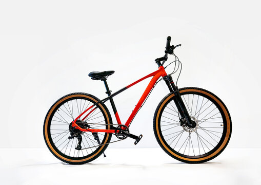 Red mountain bike isolated on white background. High quality photo
