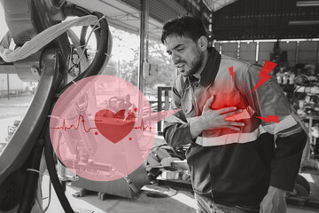 Young technician engineer or worker man in safety uniform suffering from chest pain or heart attack...