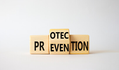 Protection and Prevention symbol. Wooden cubes with words Prevention and Protection. Beautiful white background. Business concept. Copy space