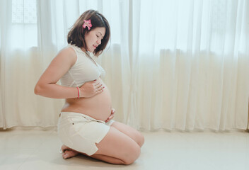 A woman who is 8 months pregnant with each verb.