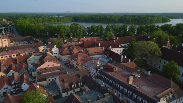 Historic tower on Market square. Unbelievable aerial top view flight.
Brewery Town Trebon Wittingau, South Bohemia czech republic Europe, summer 2023. 
fly reverse drone 4K uhd cinematic footage.