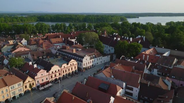 Historic Market square with fountain. Breathtaking aerial top view flight.
Town Trebon Wittingau, South Bohemia czech republic Europe, summer 2023. 
panorama overview drone 4K uhd cinematic footage.