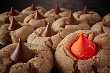 Cookies with chocolate kisses and one orange kiss