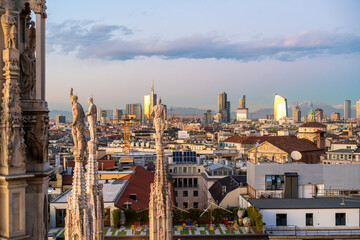 Fototapeta na wymiar View of the skyline of Milan with Dome statues, Milan, Italy