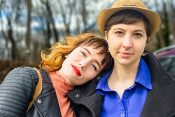 Coworkers pose  outside for camera