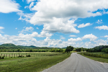 Fototapeta na wymiar Bend in road on Texas Hill Country ranch.