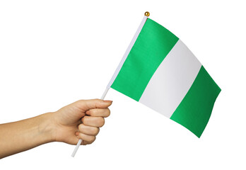 Female hand holding Nigeria flag isolated on white background, template for designers