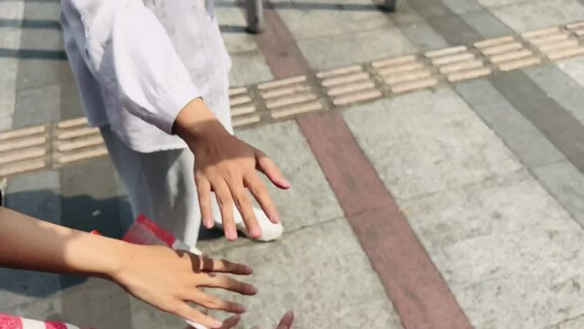 Stacking hands to celebrate Indonesia Independence Day