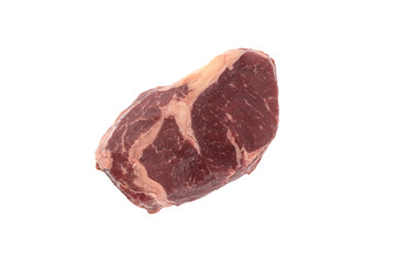 Raw beef steak on a white background. Beef steak closeup isolated on white background.