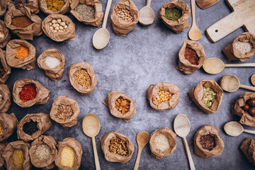spice background, top view. Seasoning in cups. Food. Background. Spices. Herbal. Fruits. Nuts. 