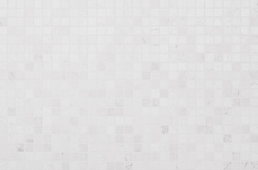 White tile wall chequered background bathroom floor texture. Ceramic wall and floor tiles mosaic background in bathroom.