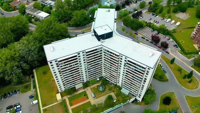 Laval Northshore drone aerial rise overlooking homes condos by the prairies river in a quiet secluded neighborhood for public and private boating docks with varying available areas South end YULD2-3