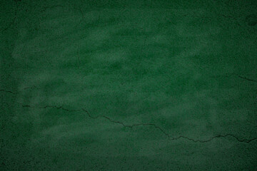 Vintage green chalkboard texture: Erased chalk traces on grunge backdrop. Ideal for school displays...