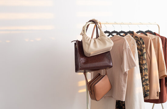 female beige capsule summer wardrobe in  white room