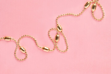 Golden chain on pink