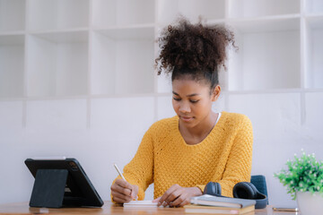Learning online working concept. woman working on tablet and laptop computer, searching working in home.