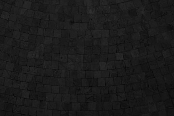 Stylish black mosaic tile backdrop, perfect for modern bathrooms and kitchens, with a sleek monochrome design.