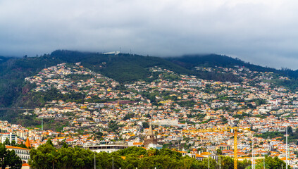 View over Funchal city on the Island Madeira, Portugal. As seen from harbor.