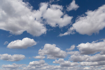 view on white fluffy clouds in a sky