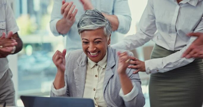Professional win, senior woman and team with applause, reward and positive feedback with promotion and celebration. Wow, support and success with female person winning or performance bonus at work